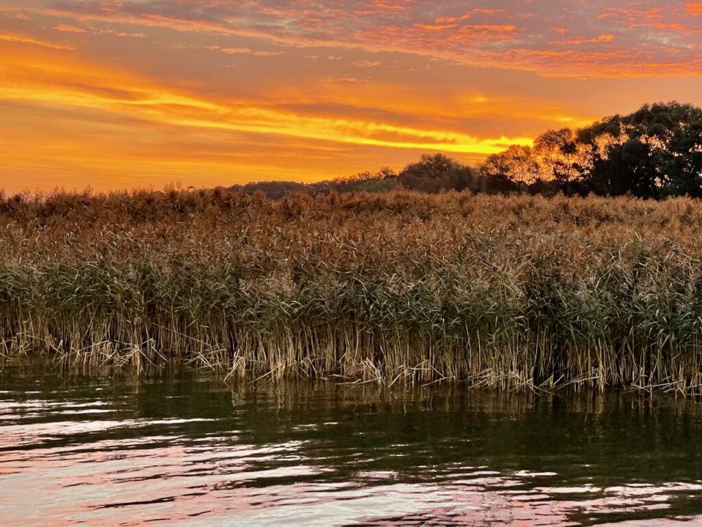 Wo ist das Stettiner Haff? Sonnenaufganb ueber dem Haff